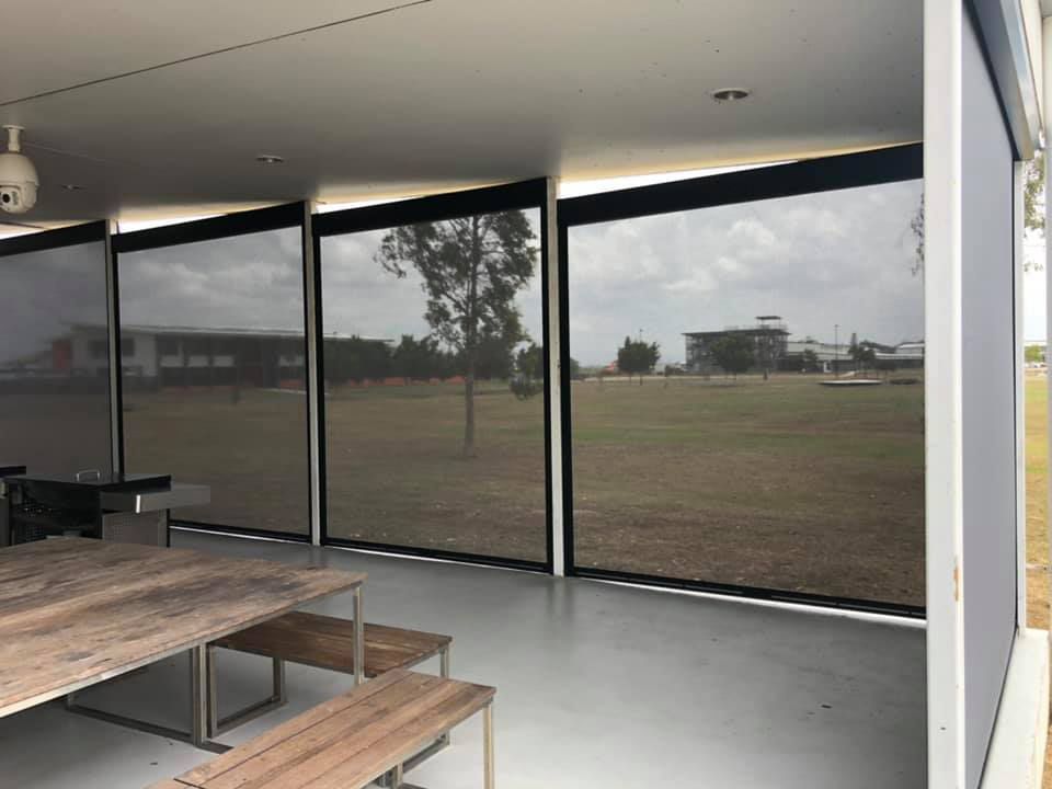 A Room With a Table and Benches and a Lot of Windows — Whitsunday Blinds & Security In Beaconsfield, QLD
