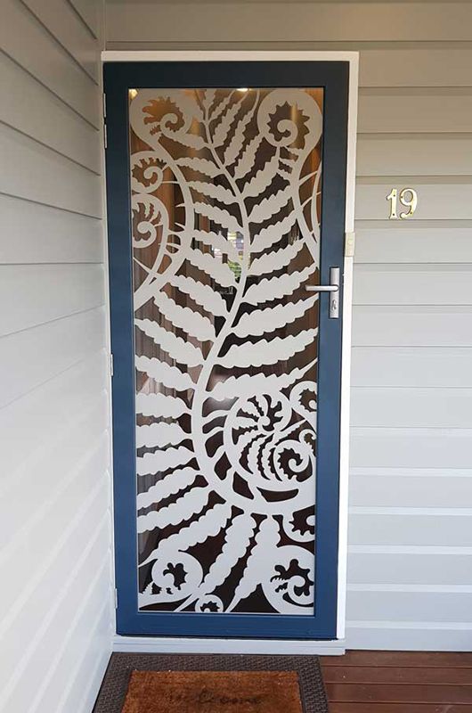 A Blue Door With a Fern Design — Whitsunday Blinds & Security In Beaconsfield, QLD