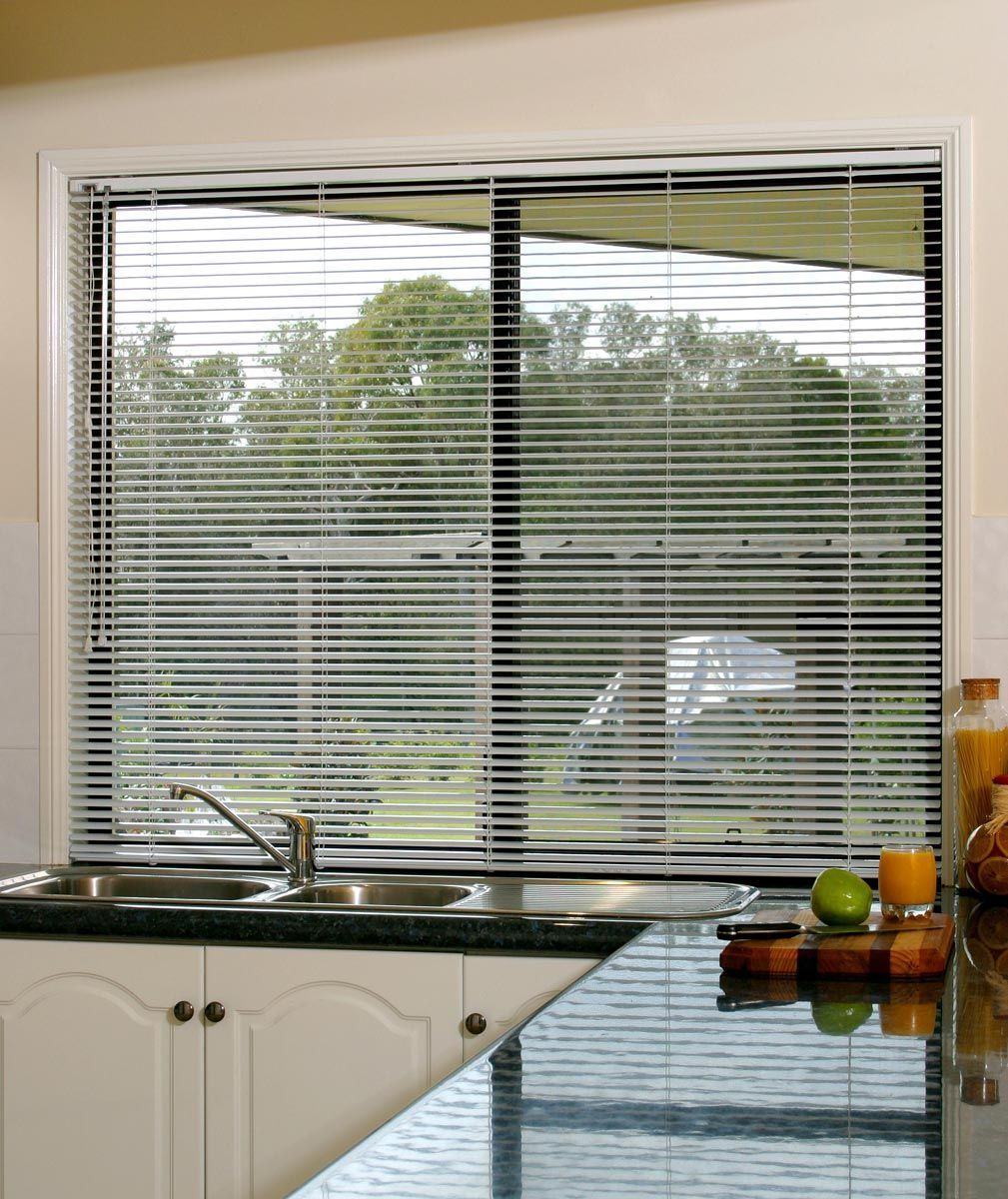 Kitchen With Sink Next to Window With  Venetian Window Blinds — Whitsunday Blinds & Security In Beaconsfield, QLD