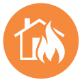 A house with a fire coming out of it in an orange circle.