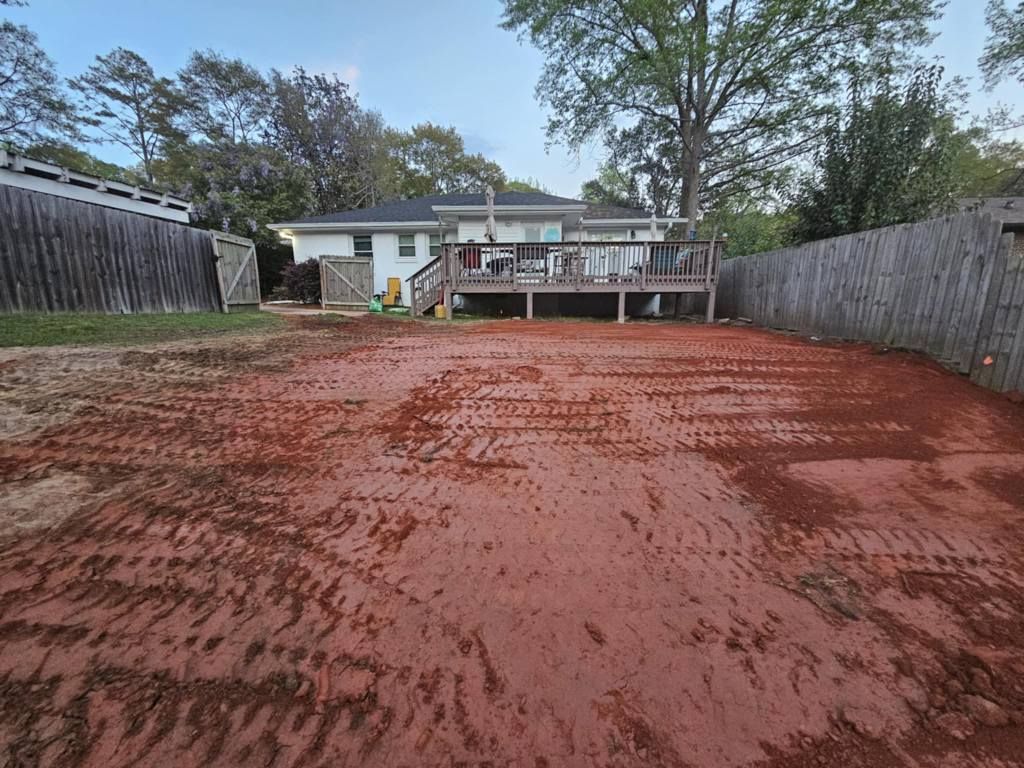 A man is loading boxes into a white van