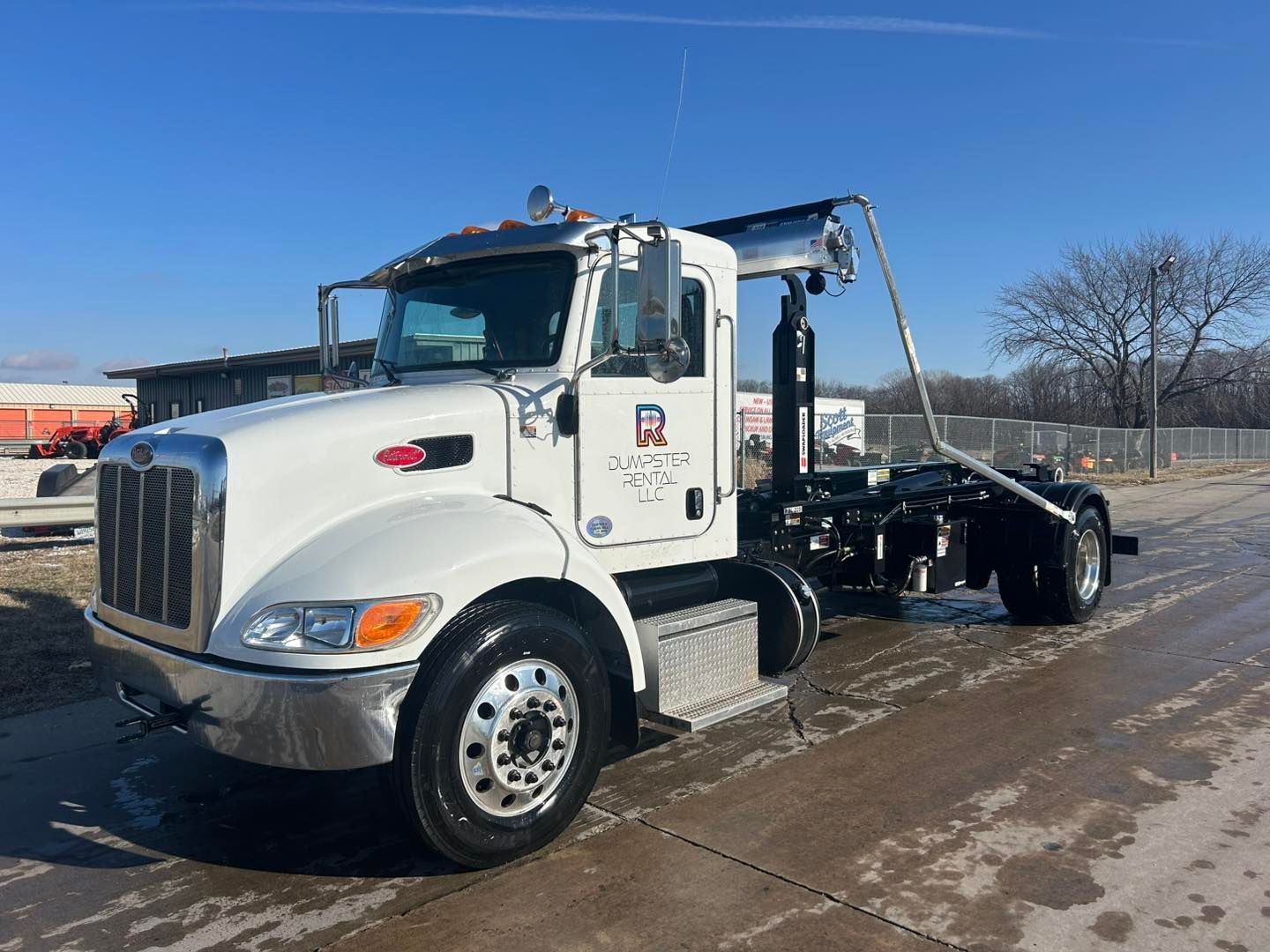 Rhythm Dumpster Rental LLC dumpster truck