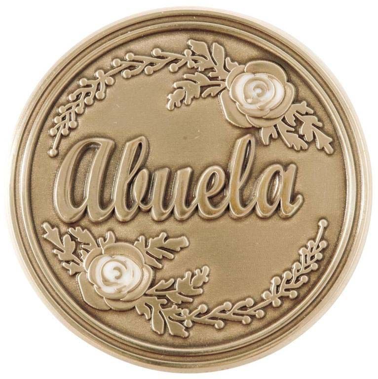 A gold coin with the word abuela on it