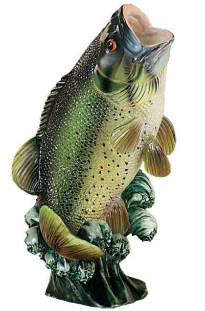 A statue of a fish with its mouth open