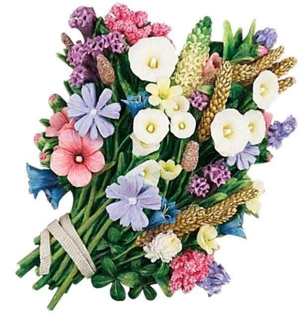 A bunch of flowers are tied together with a ribbon