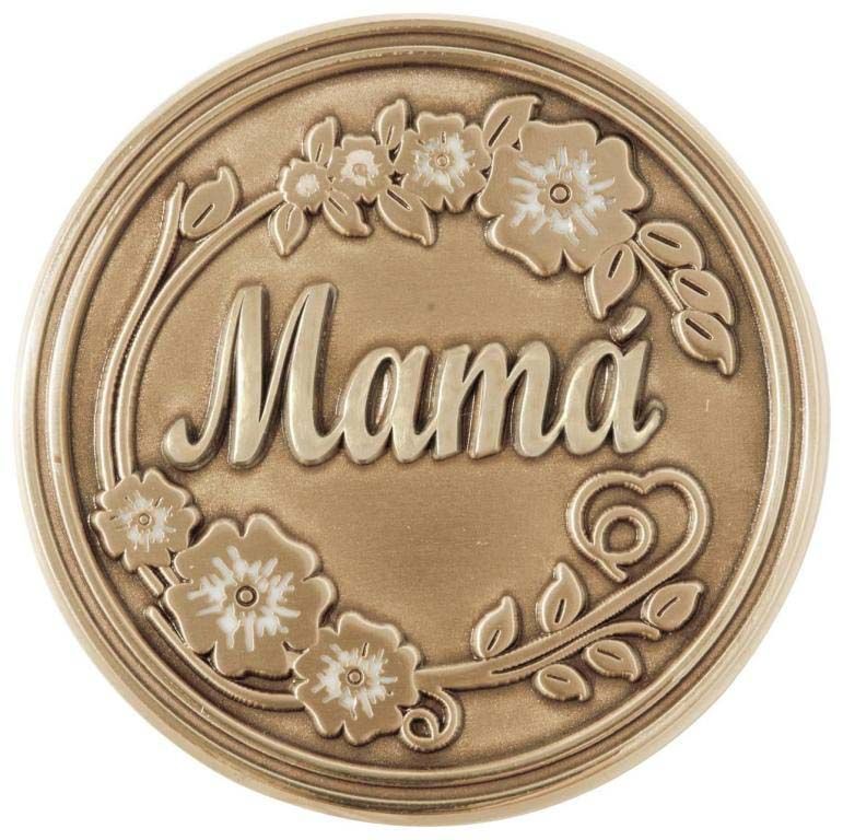 A gold coin with the word mama on it