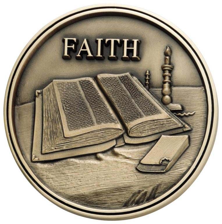 A gold coin with the word faith on it