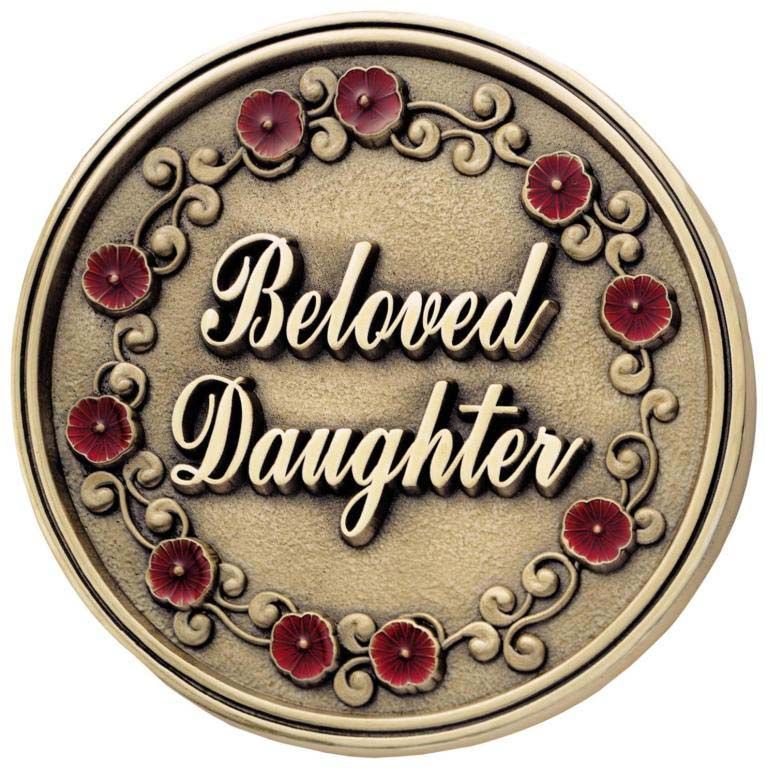 A coin that says beloved daughter on it