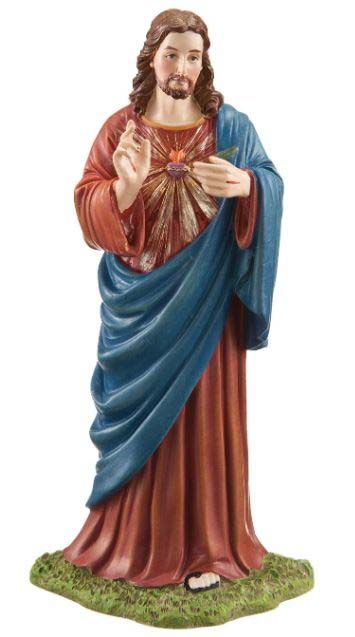A statue of jesus holding a heart in his hands.