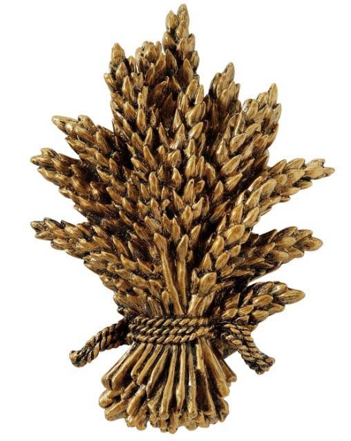 A statue of a bunch of wheat on a white background