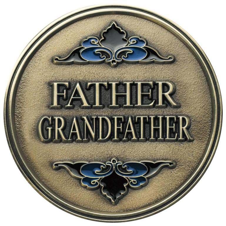 A coin that says father grandfather on it
