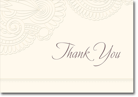 A thank you card with a floral design on it.