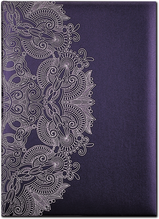 A purple book with a lace pattern on it