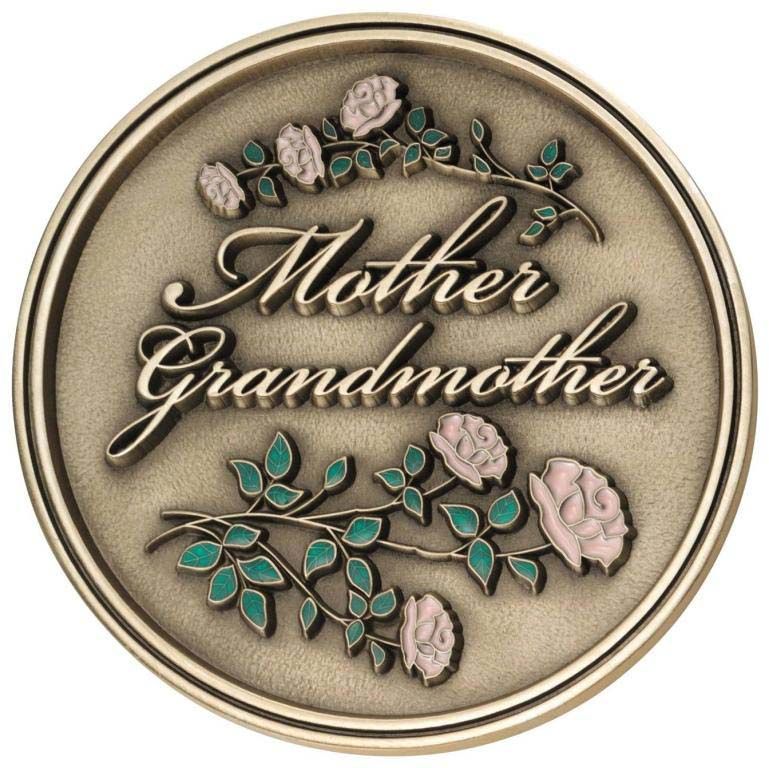 A coin that says mother grandmother on it