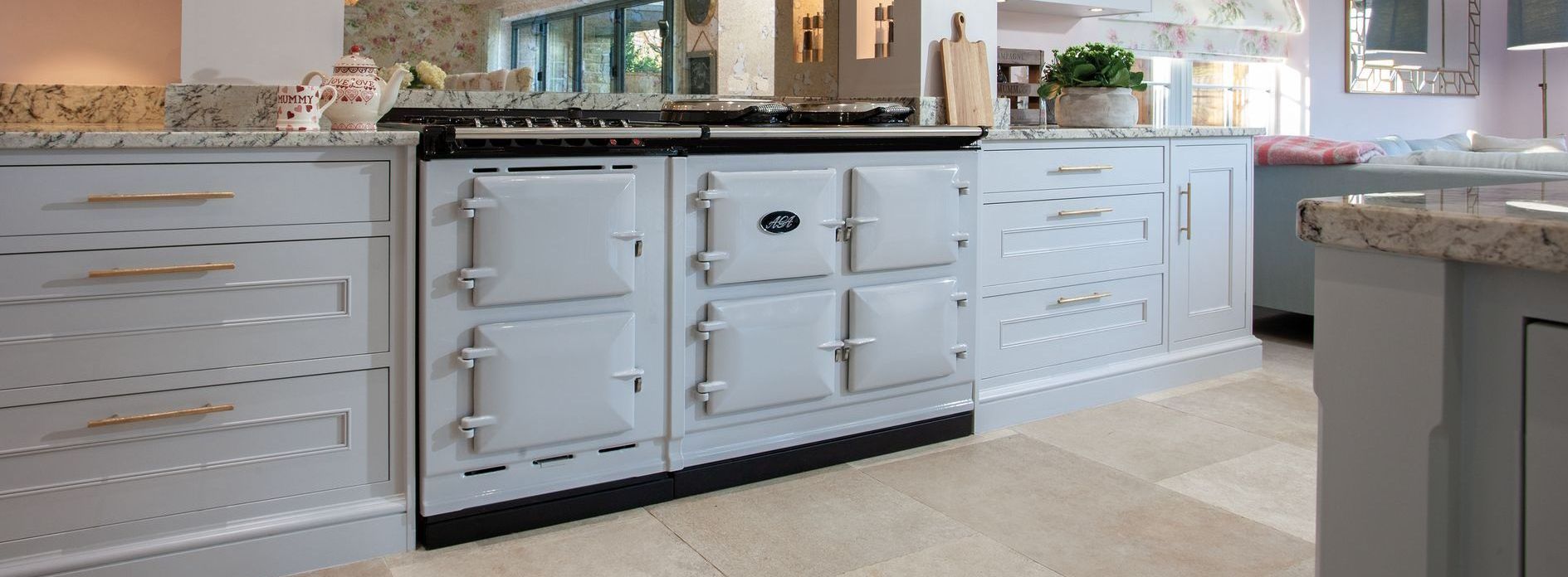 Photograph of AGA eR7-160 Cast Iron Electric Range Cooker installed in a contemporary kitchen