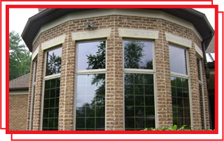 bricked house with tinted modern styled windows near colorado springs