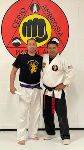 Cerio Ambrosia Martial Arts picture with another martial artist.