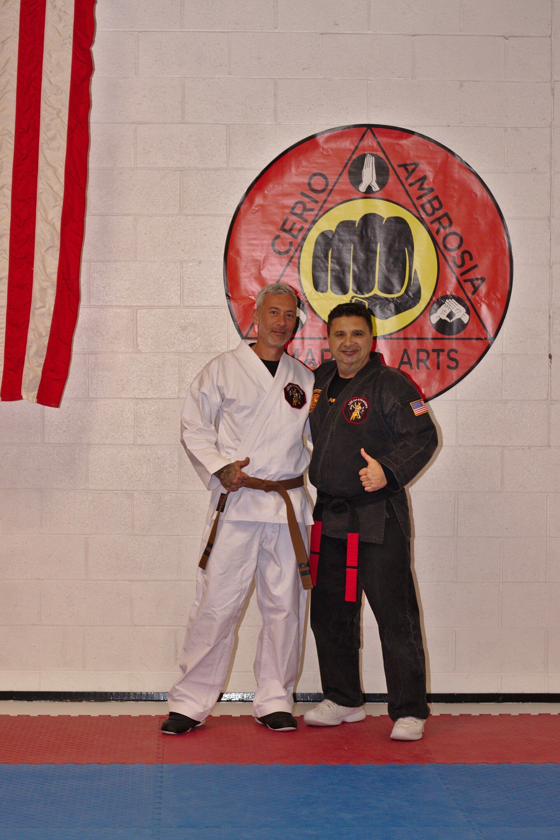 Cerio Ambrosia Martial Arts picture of owner with martial arts partner.