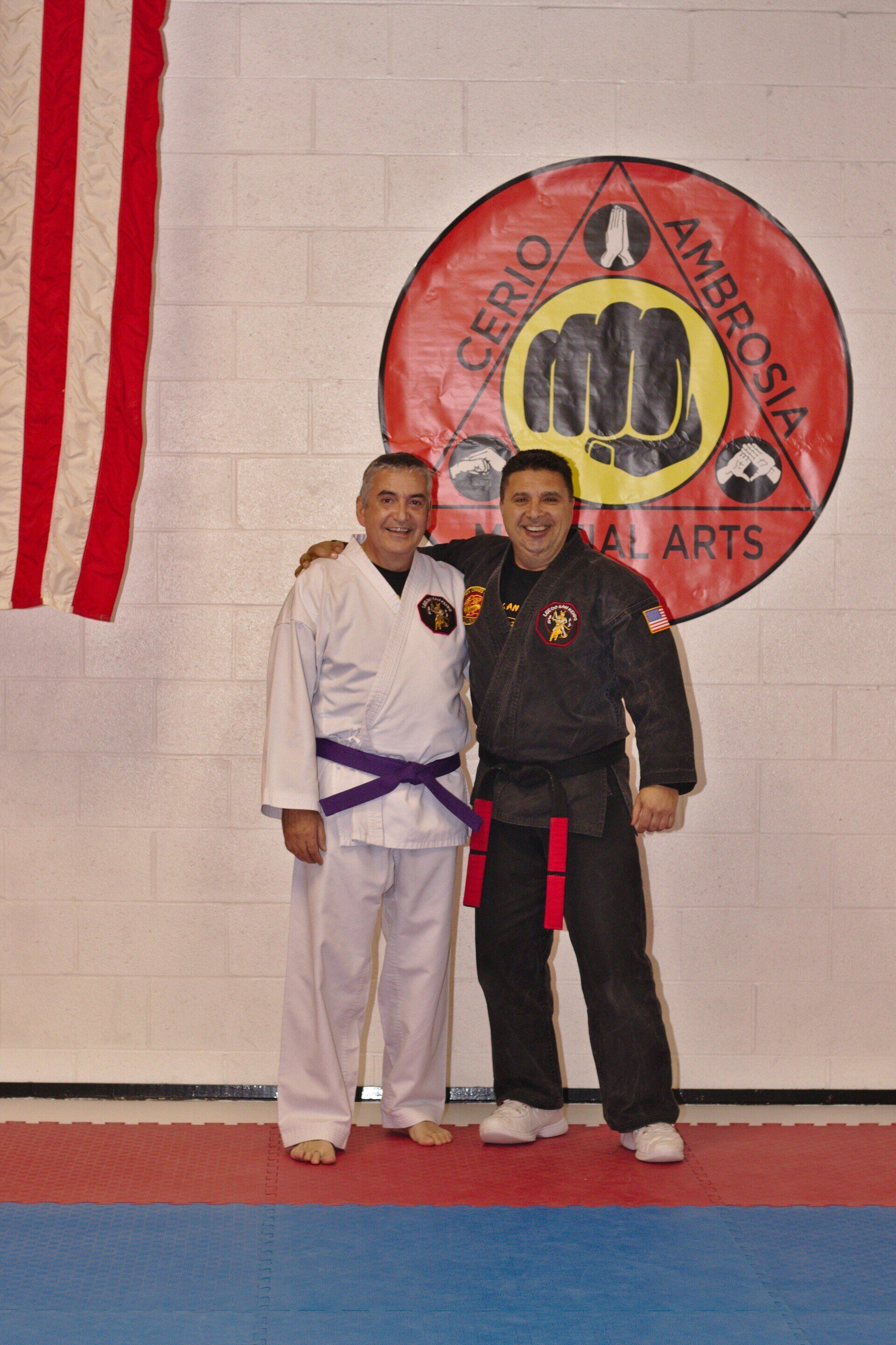 Cerio Ambrosia Martial Arts picture of owner with martial arts partner.