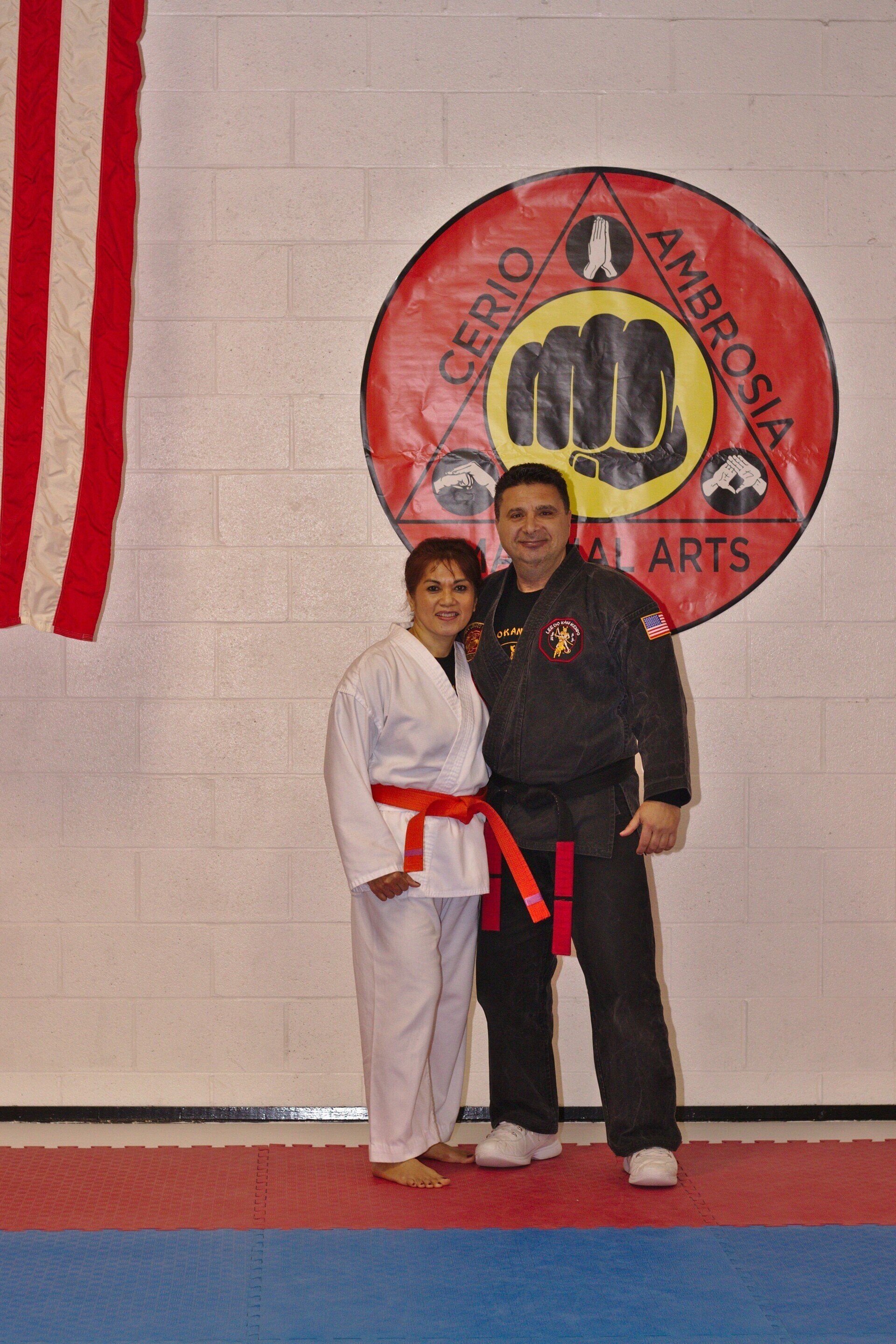 Cerio Ambrosia Martial Arts picture of owner with martial arts partner.