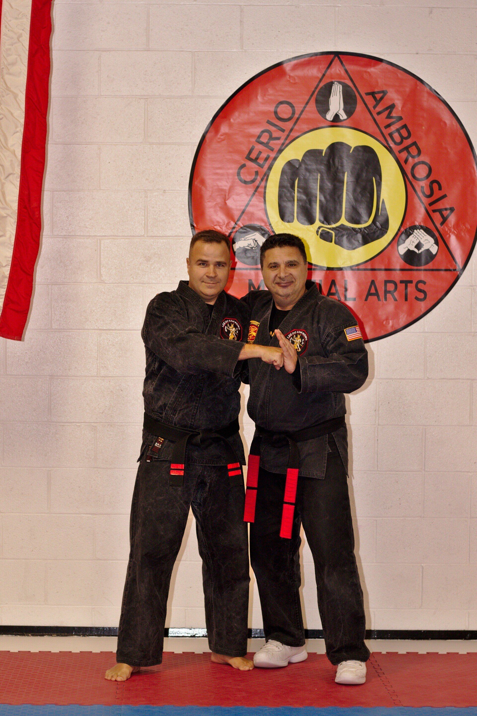 Cerio Ambrosia Martial Arts picture of owner with martial arts partner.