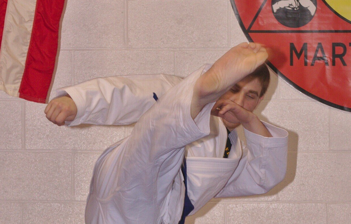 Cerio Ambrosia Martial Arts picture, photo of a man kicking.