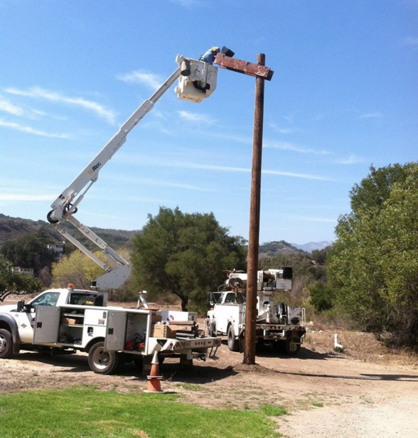 Line Worker on Bucket Crane Truck — Ventura, CA — Oilfield Electric & Motor