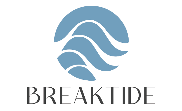 Logo featuring a slate blue circular icon of stylized waves above the text "BREAKTIDE" in a black serif font.