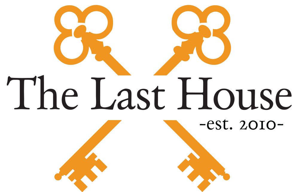 Logo for "The Last House -est. 2010-" featuring two orange keys crossed in an X pattern against a white background.