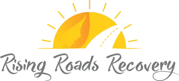 The logo for rising roads recovery shows a sun and a road.