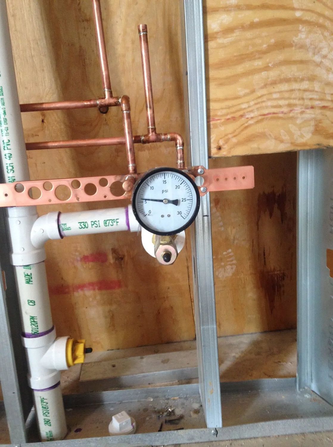 Plumbing in a Wall Cavity with a Pressure Gauge