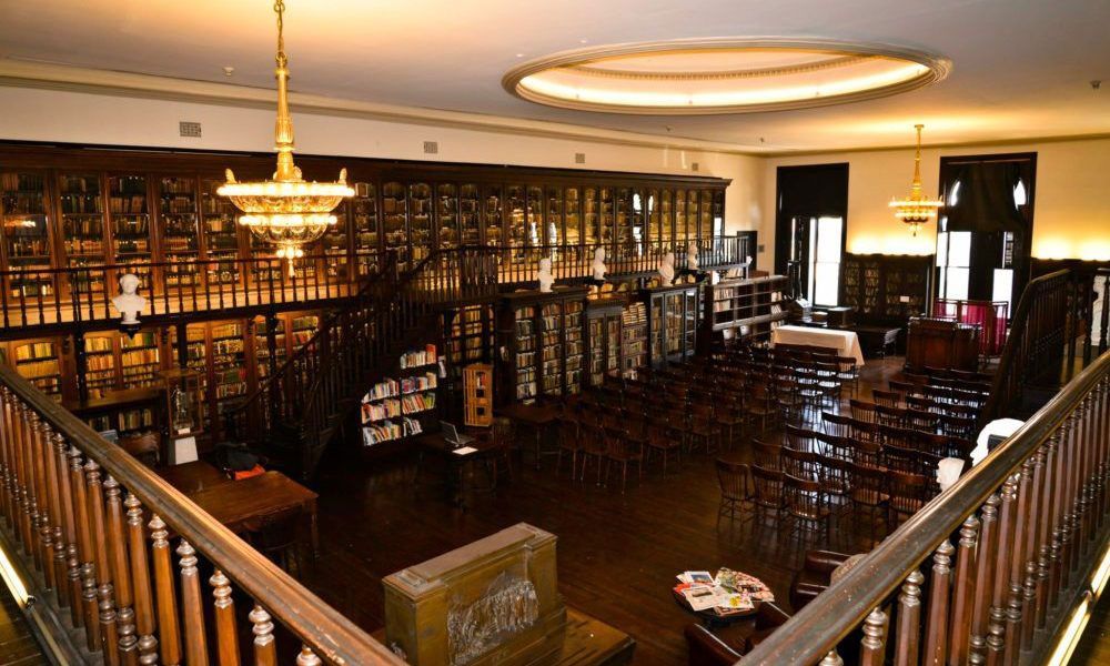 An aerial view of a library with lots of books on shelves