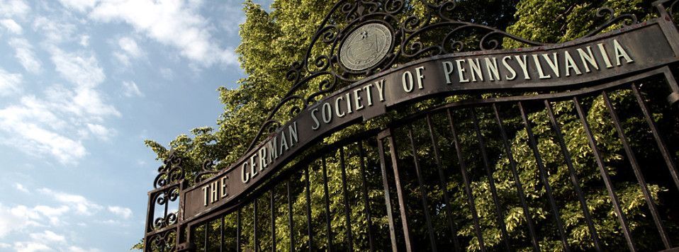 A gate with a sign that says the veterinary society of pennsylvania