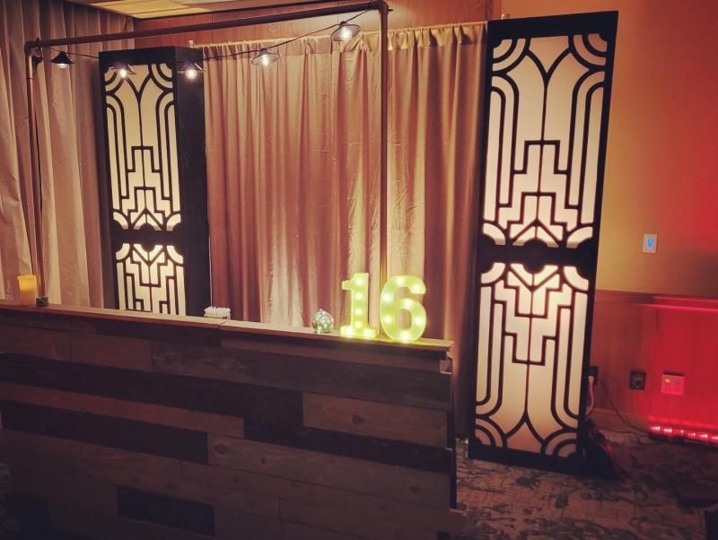 A rustic bar with a lit-up