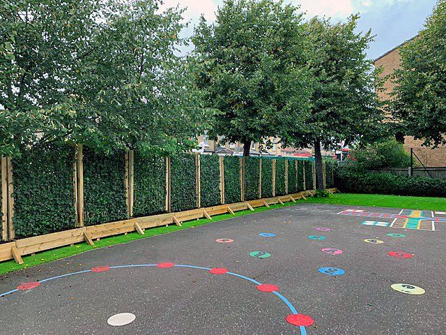 Mobilane green screens installed into timber planter boxes to filter harmful pm10 pollutants #greenmyschool