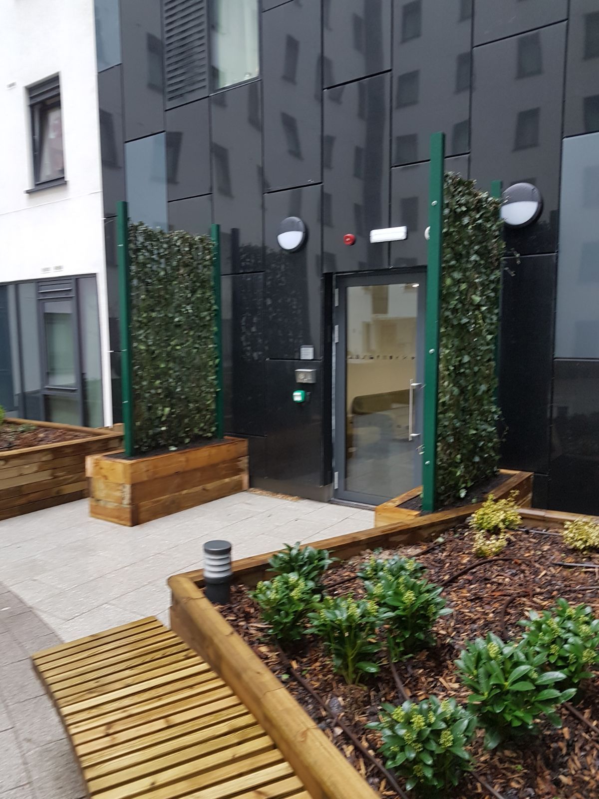 Mobilane green screens installed and soft landscaping