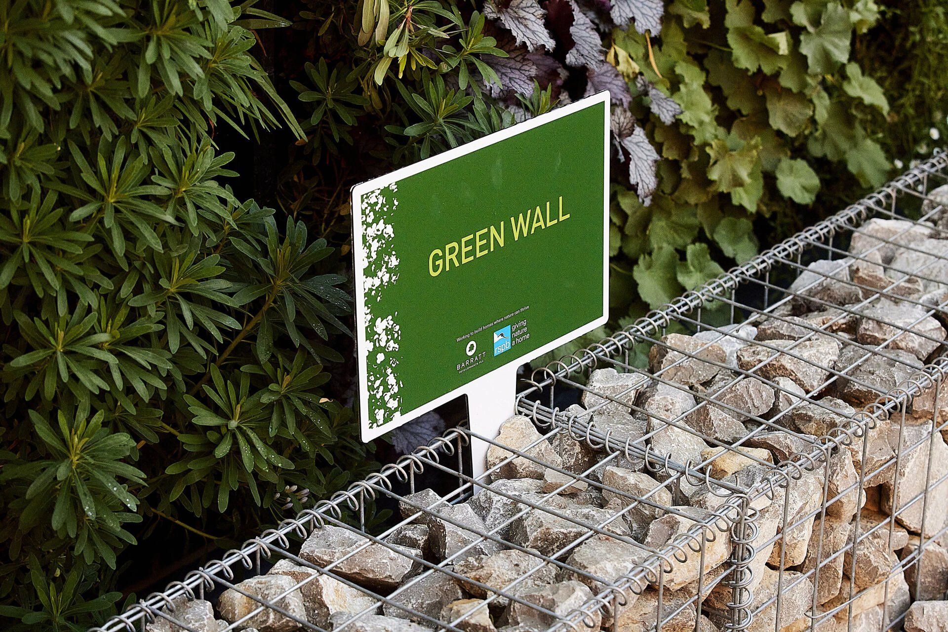 We installed a plantbox living wall and mobilane green screens for Barratt  homes z house eco project house