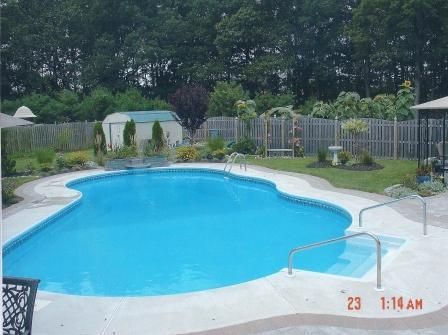 A picture of a large swimming pool was taken at 1:14 am