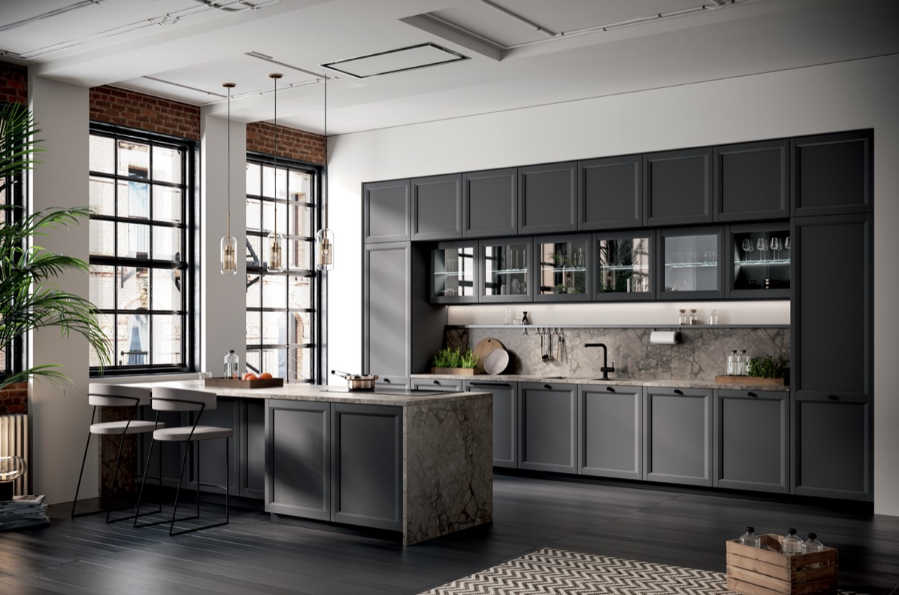 L’anta a telaio con la sua personalità, la sua capacità di riflettere la luce e di donare profondità, è simbolo di uno stile classico che può essere abbinato ad aperture a gola, a maniglie e a pomoli. Contemporanea e dagli echi vintage, grazie alla combinazione di elementi sobri e ricercati l’anta telaio esalta gli ambienti più esclusivi, creando uno spazio dalla raffinatezza intramontabile e dall’impatto estremamente attuale. Le ricercate maniglie a ponte
e i pomoli di metallo godronato offrono funzionalità e praticità senza rinunciare all’estetica, esprimendo una lettura eclettica e disegnando geometrie assolutamente contemporanee.