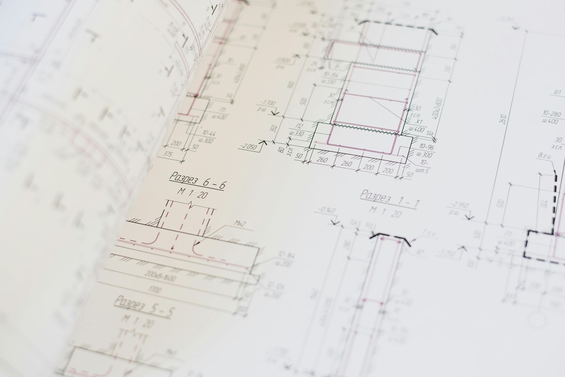 A close up of a drawing of a building on a table.