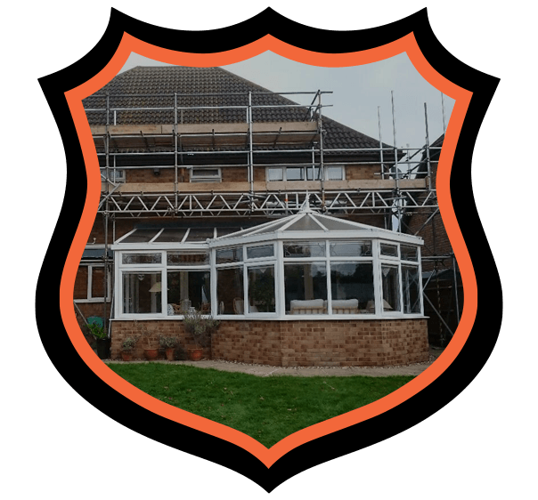 Domestic scaffolding on the back of a detached house