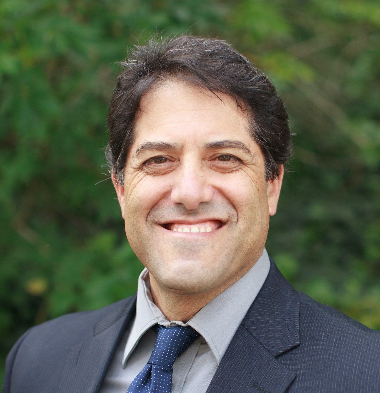 Woman in red sweater smiling, with sunglasses on head. Woman in red sweater smiling, with sunglasses on head.