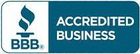 A blue and white sign that says `` accredited business ''.