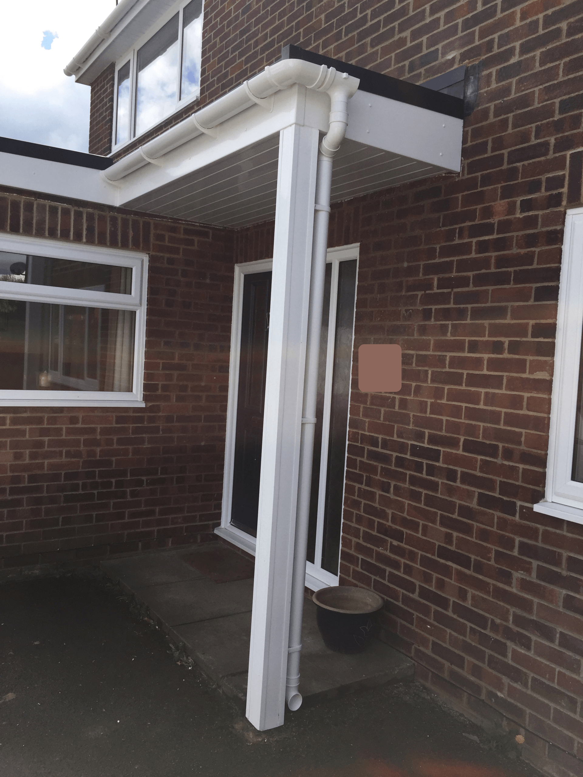 new guttering and downpipe on porch