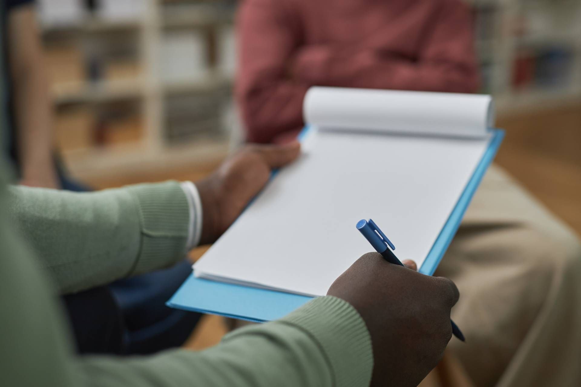 A counselor holding a piece of paper to help a client with life mapping services in Lexington, Kentucky (KY)