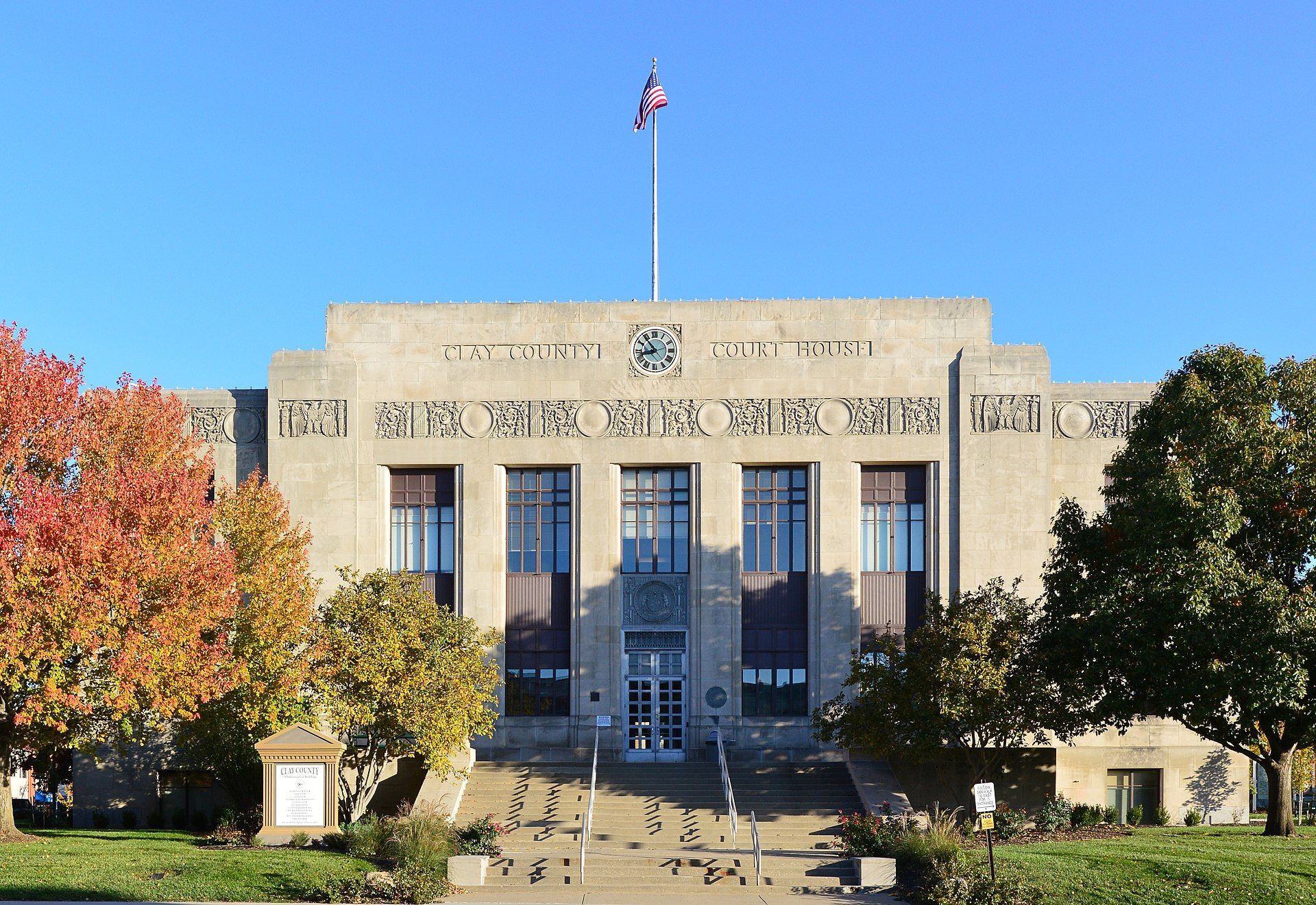 a large building with a flag on top of it