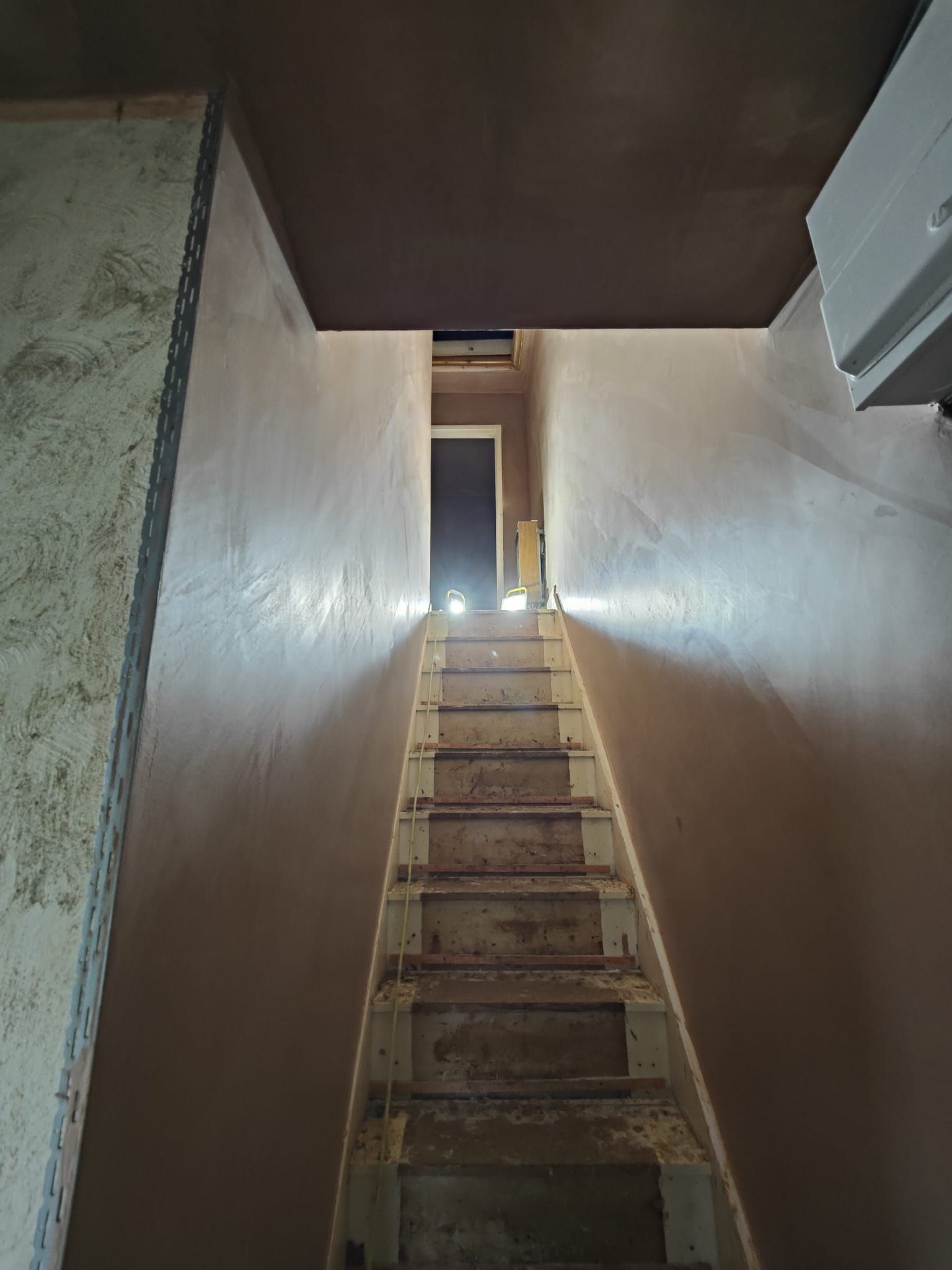 A staircase leading up to the second floor of a house.