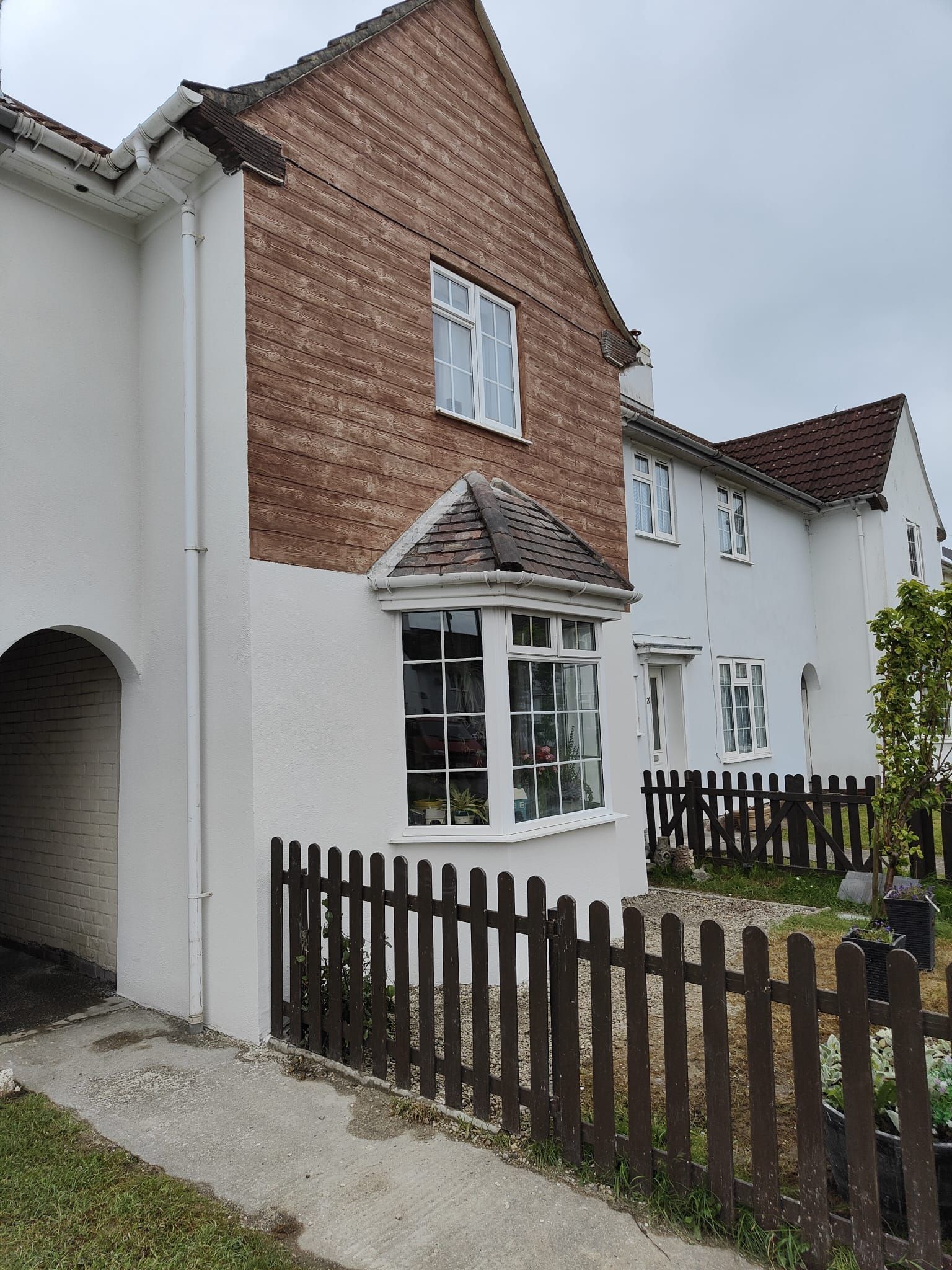 House in Southampton with wood effect render