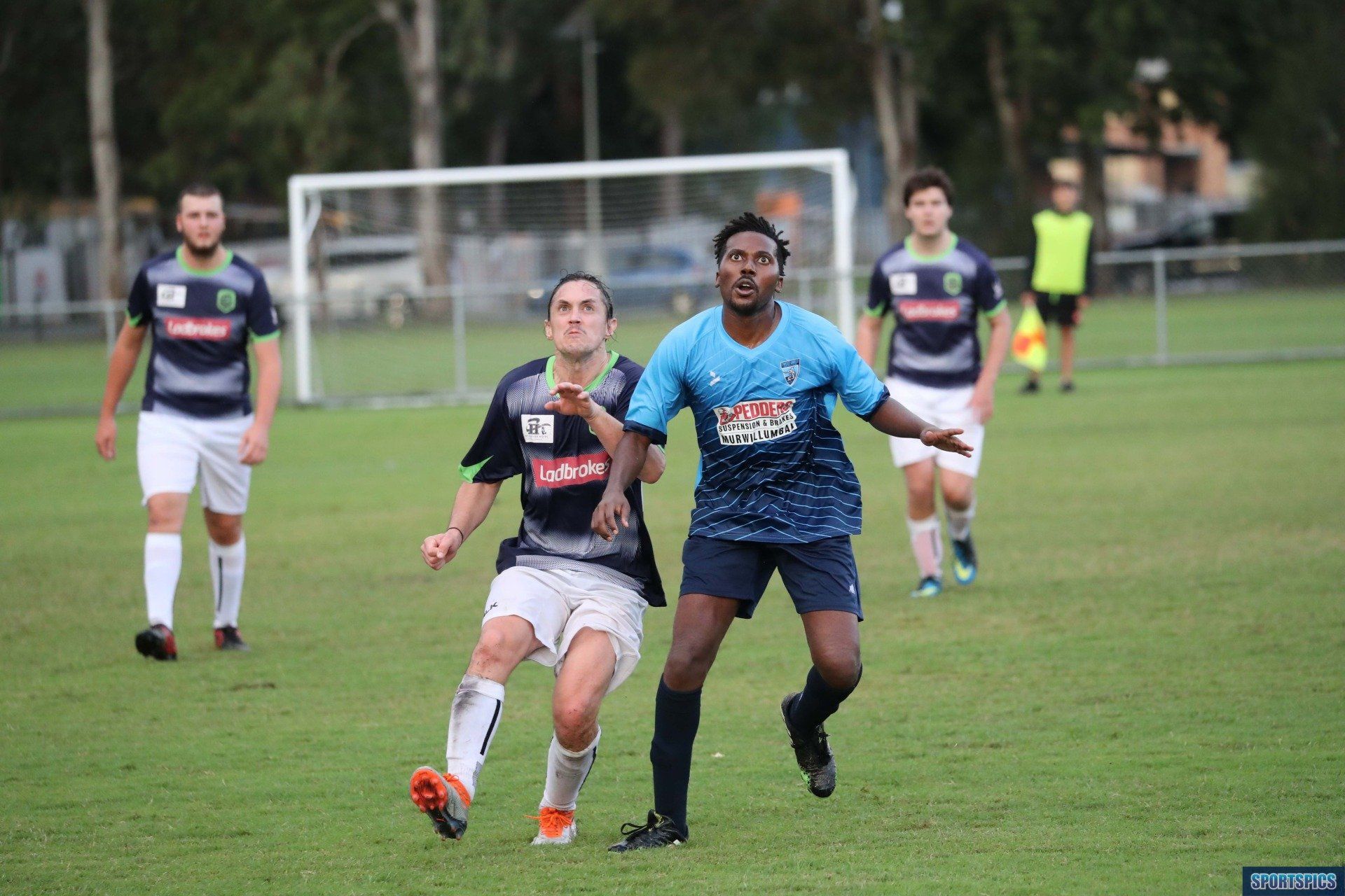 tweed united footballer awaiting a header