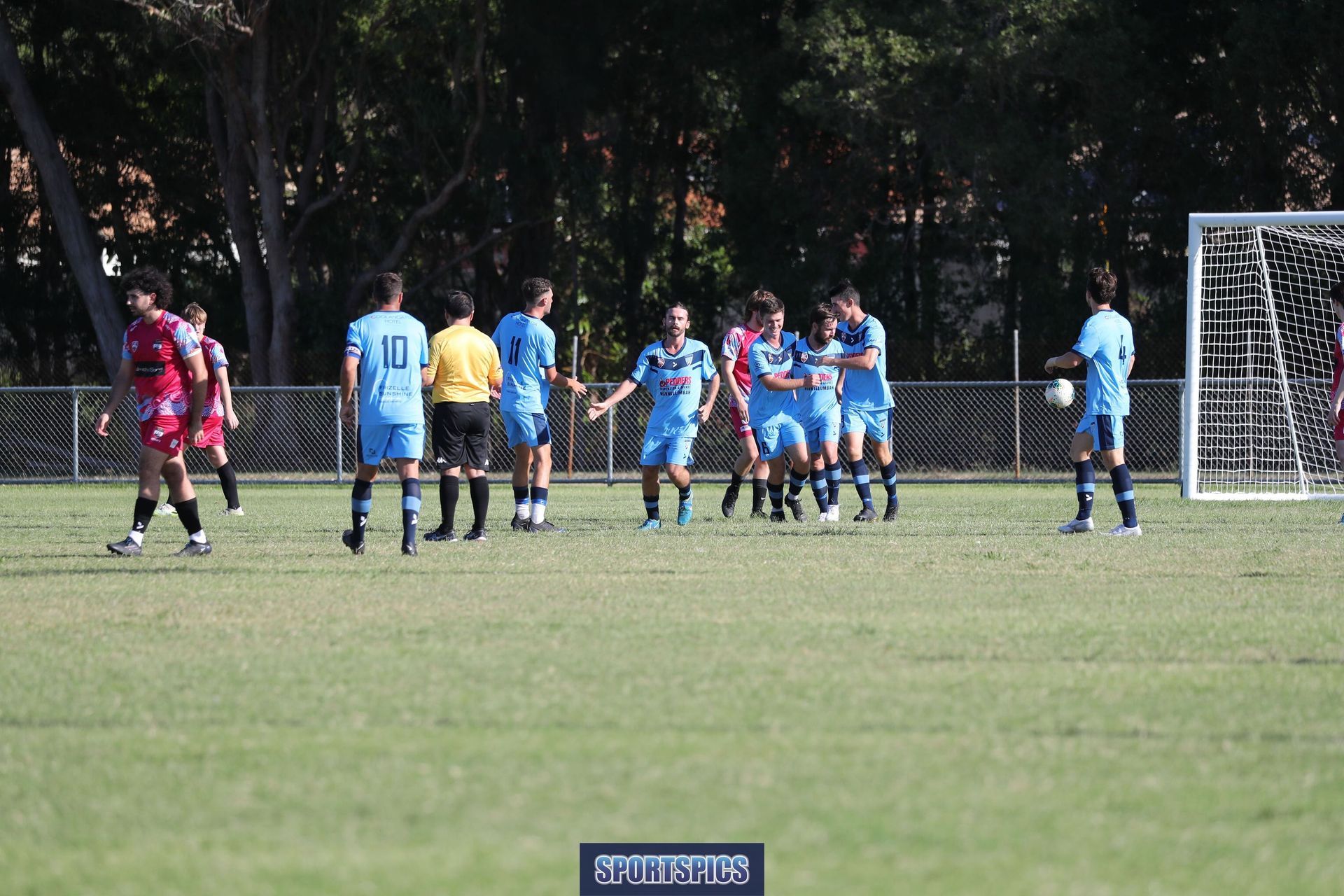 tweed united footballers celebrating a goal